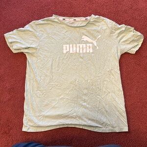 Mint Green Shirt. From Puma. Worn many times yet is still in good condition.